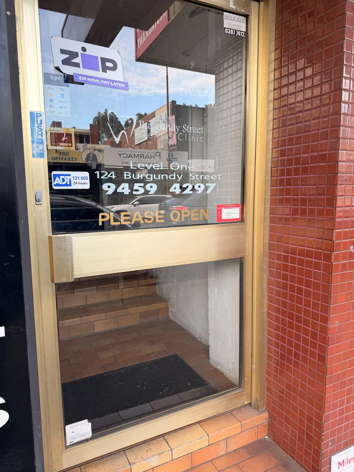 The street entrance to Burgundy Street Dental Clinic at 124 Burgundy Street
